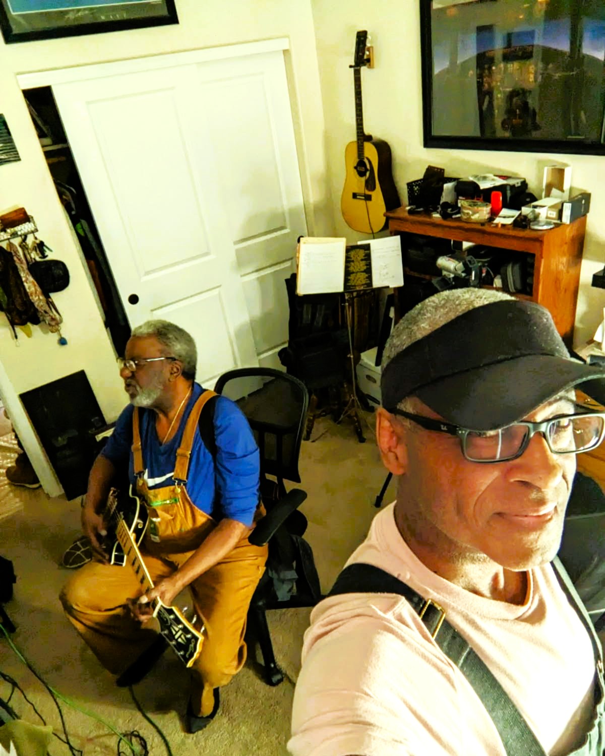 Don C strumming away with MDW snapping away Guitar Don